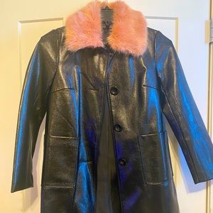 NWOT beautiful modern faux leather jacket with a pink faux fur collar